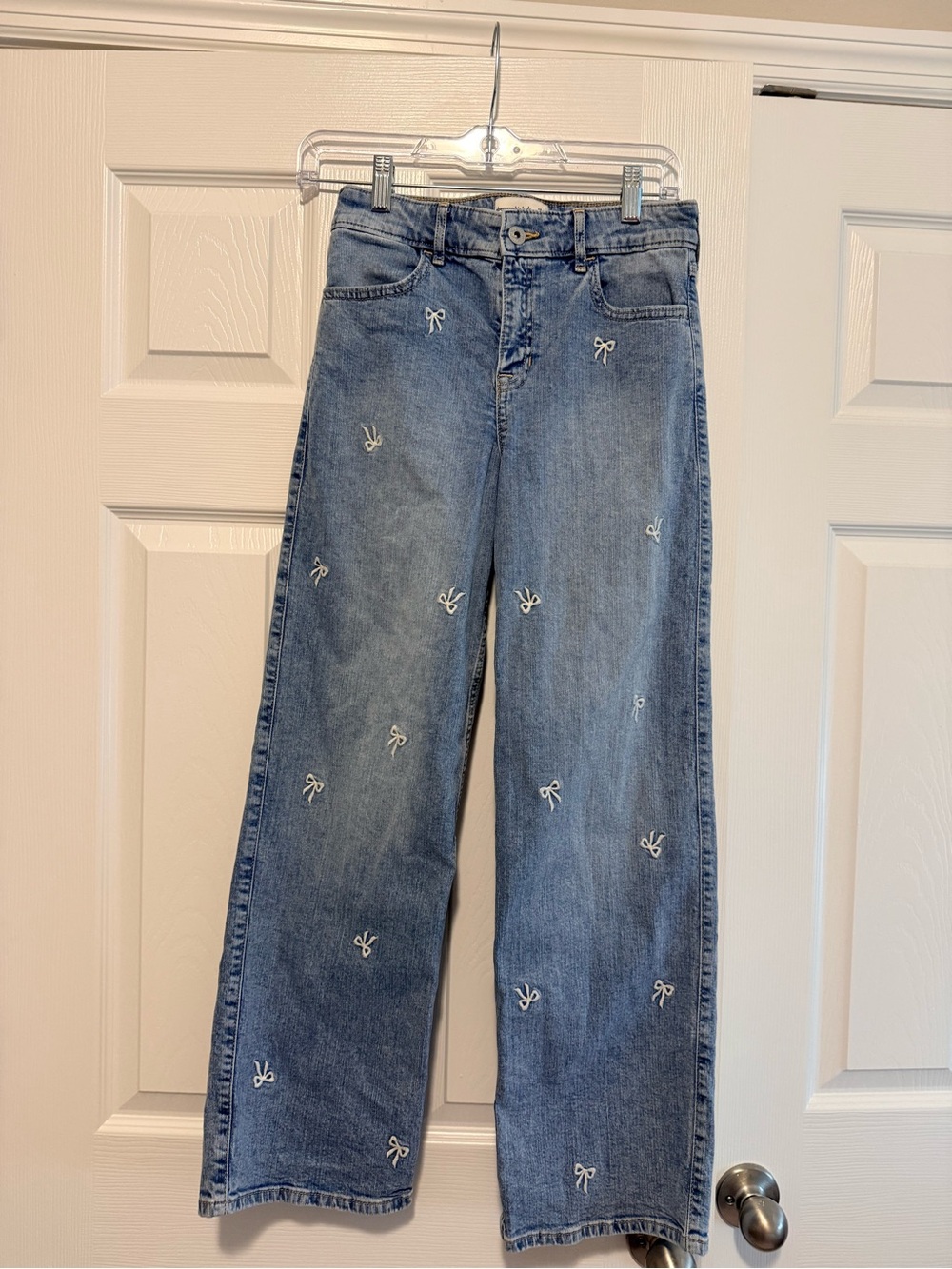 abercrombie kids light blue wide-leg jeans with white bow embroidery